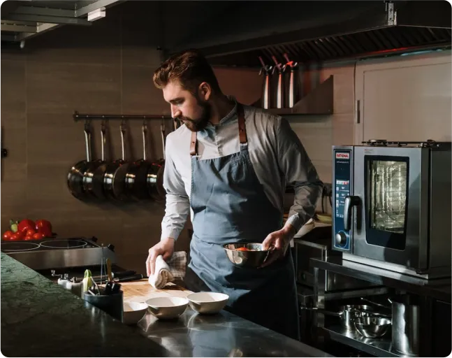 A collage of various private chefs in apron and either smiling confidently at the viewer or working on a dish